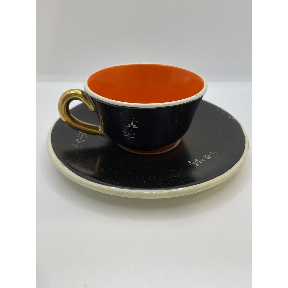 Vintage Italy Teacup And Saucer Black With Orange Center Marked Gold Handle